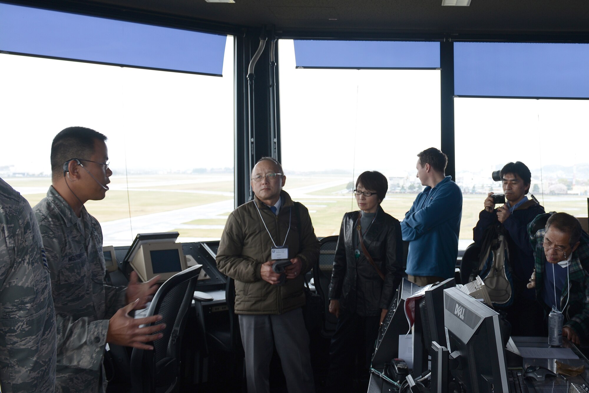 Tech. Sgt. Lan Nguyen, 374th Operation Support Squadron air traffic controller, gives a briefing during the Mid-Air Collision Avoidance conference at Yokota Air Base, Japan, April 11, 2015.  The MACA conference is designed to give local pilots a better understanding of Yokota's flight and approach control operations leading to a safer flying environment across the Kanto Plain. (U.S. Air Force photo by Airman 1st Class David C. Danford/Released)