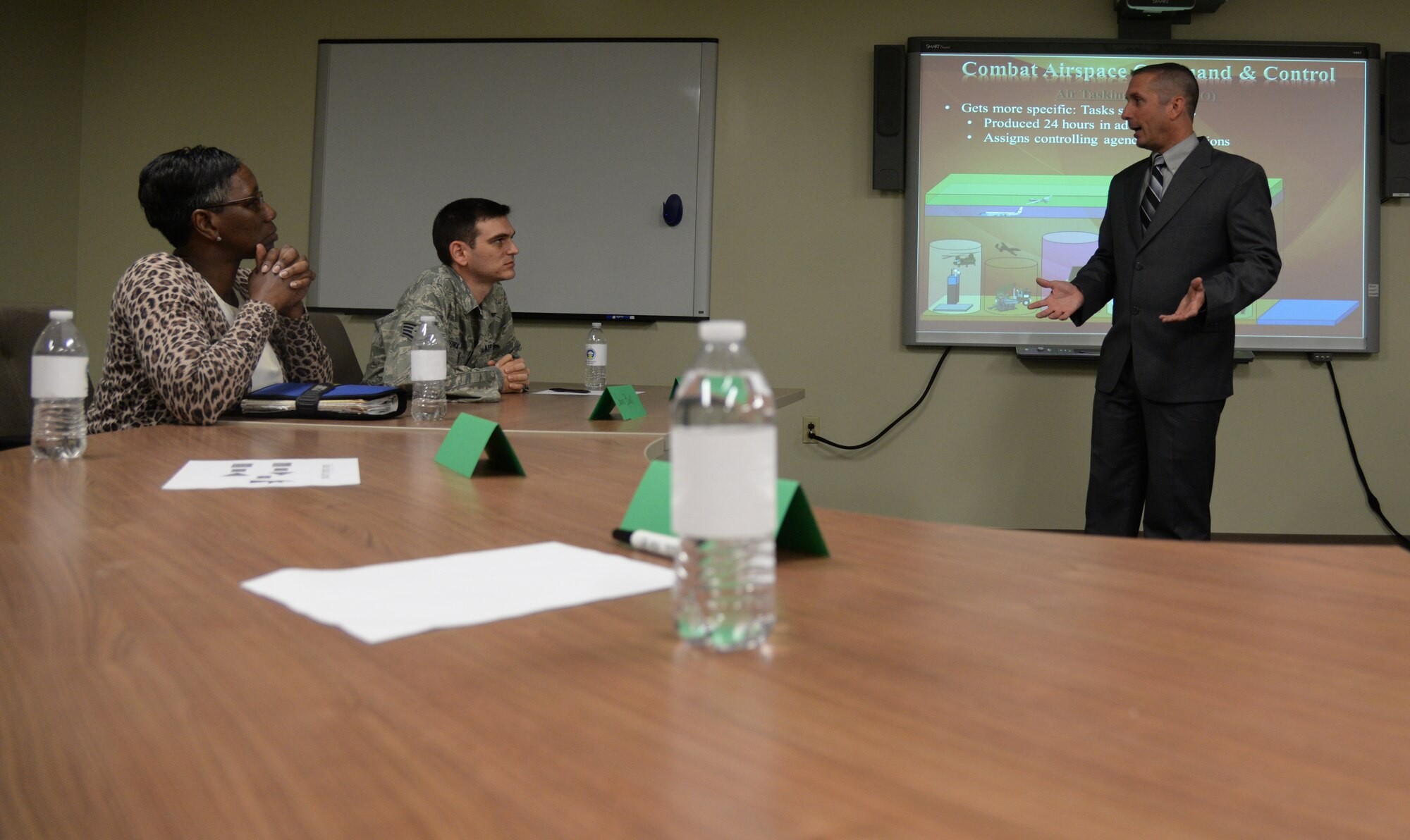 Troy Kirkbride, 334th Training Squadron instructor, briefs participants during the 2015 Top Tech competition April 9, 2015, Keesler Air Force Base, Miss. During the competition, 18 instructors from the 81st Training Group performed 50-minute presentations highlighting their jobs. (U.S. Air Force photo by Senior Airman Holly Mansfield)