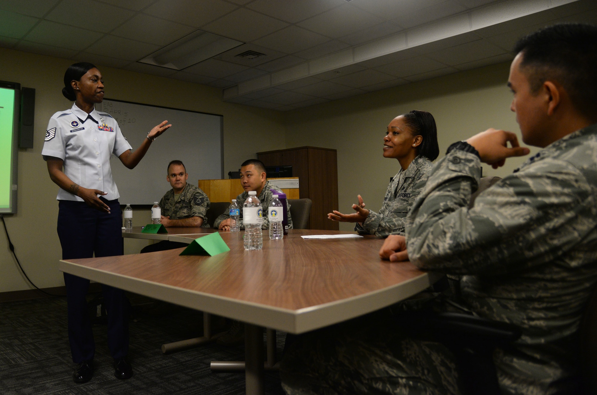 Tech. Sgt. Ashley Washington, 336th Training Squadron instructor, briefs participants during the 2015 Top Tech competition April 9, 2015, Keesler Air Force Base, Miss. During the competition, 18 instructors from the 81st Training Group performed 50-minute presentations highlighting their jobs. (U.S. Air Force photo by Senior Airman Holly Mansfield)