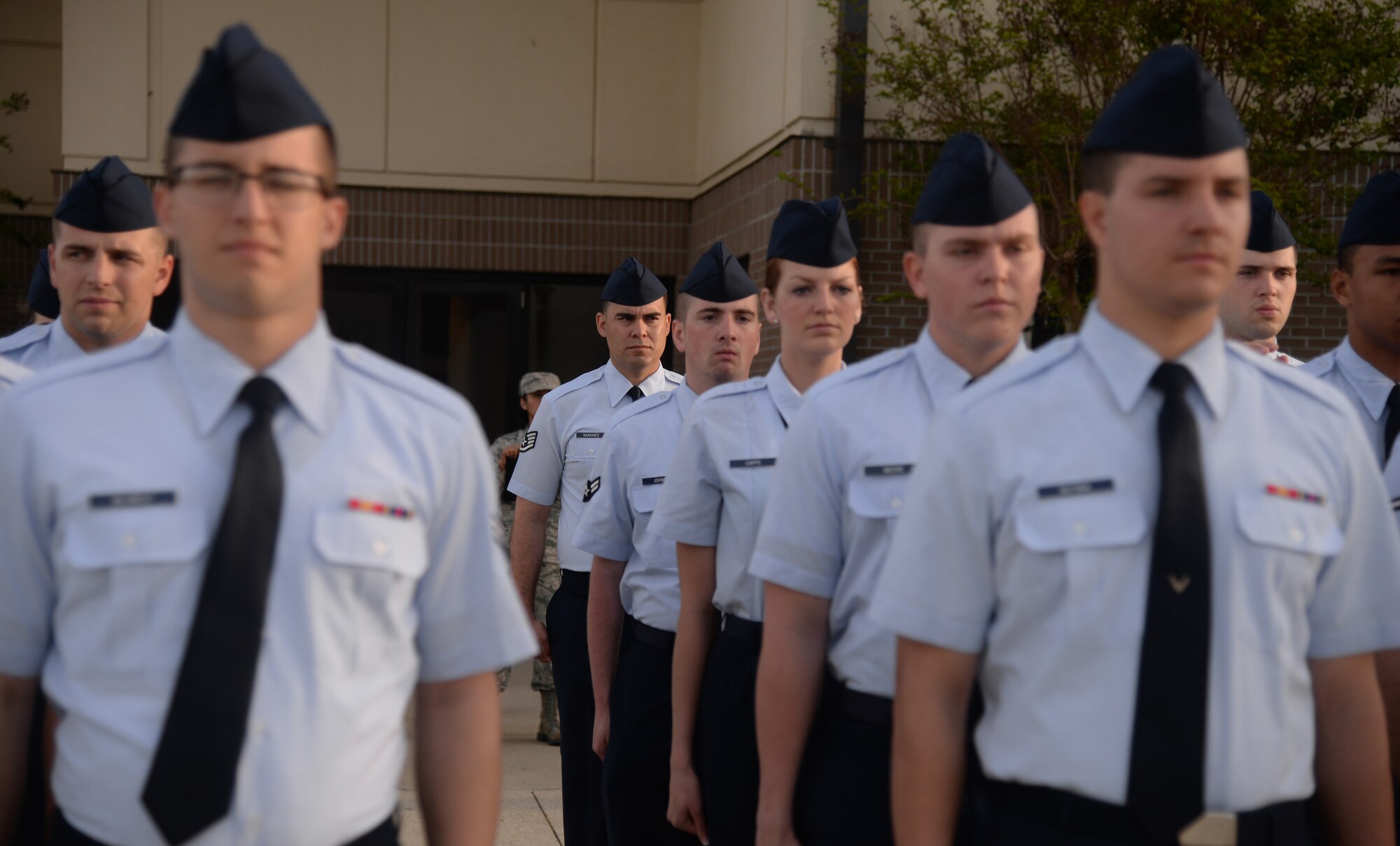 Staff Sgt. Jordan Sanchez, 335th Training Squadron military training leader, conducts open ranks during the 2015 Top Tech competition April 9, 2015, Keesler Air Force Base, Miss. Four military training leaders participated in the competition by performing drill, open ranks and a 20-minute briefing. (U.S. Air Force photo by Senior Airman Holly Mansfield)