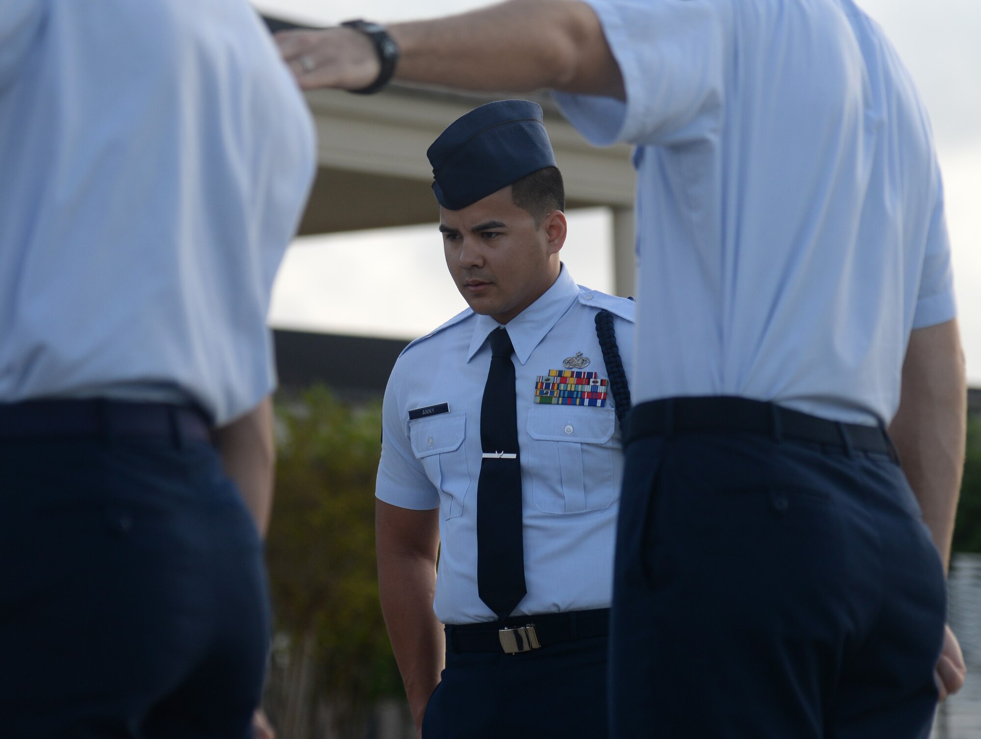 Staff Sgt. John Anny, 338th Training Squadron military training leader, conducts open ranks during the 2015 Top Tech competition April 9, 2015, Keesler Air Force Base, Miss. Four military training leaders participated in the competition by performing drill, open ranks and a 20-minute briefing. (U.S. Air Force photo by Senior Airman Holly Mansfield)