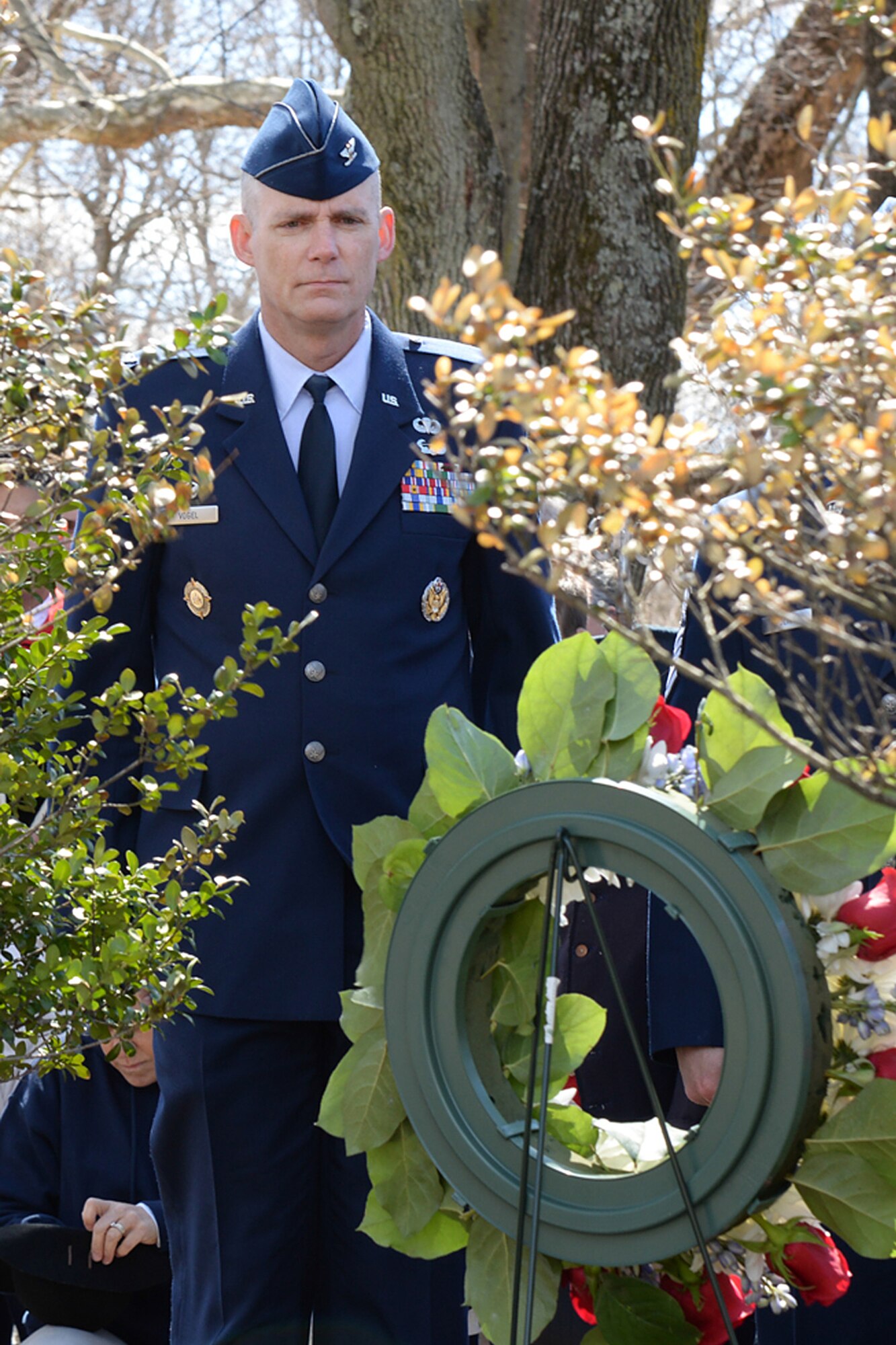 Col. Michael A. Vogel, 66th Air Base Group commander, pauses in front of a wreath placed by a Revolutionary War reenactor at Wilson Park, the site where Bedford Minutemen gathered before marching to Concord April 19, 1775, at the start of the Revolutionary War. The wreath laying was part of the town of Bedford’s annual Pole Capping event April 11. A full listing of Patriot’s Day events scheduled in the local area can be found at www.nps.gov/mima/patriots-day.htm. (U.S. Air Force photo by Linda LaBonte Britt)