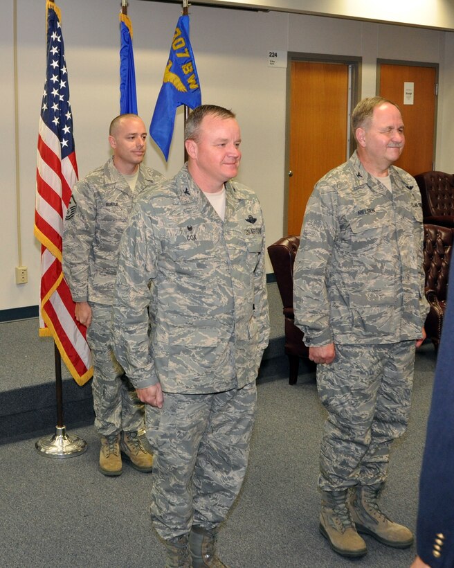 U.S. Air Force Col. Bruce Cox, commander of the 307th Bomb Wing, at Barksdale Air Force Base, La, presides over the assumption of command ceremony where Col. Mark Nielsen takes command of the 307th Medical Squadron, April 12, 2015. Col. Nielsen is returning to the 307th Medical Squadron after a two year tour at the U.S. Air Force Academy as Individual Mobilization Augmentee to the United States Air Force Academy Command Surgeon and to the Commander of the 10th Medical Group. (U.S. Air Force photo by Master Sgt. Laura Siebert/Released)