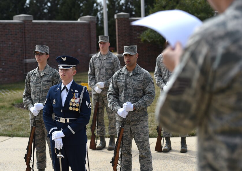 Staff Sgt. April Spilde, U.S. Air Force Honor Guard formal training instructor, commands a flight during an evaluation at Joint Base Anacostia-Bolling, Washington D.C., March 19, 2015. The USAF Honor Guard’s mission is to represent Airmen to the American public and the world. (U.S. Air Force photo/ Senior Airman Nesha Humes)