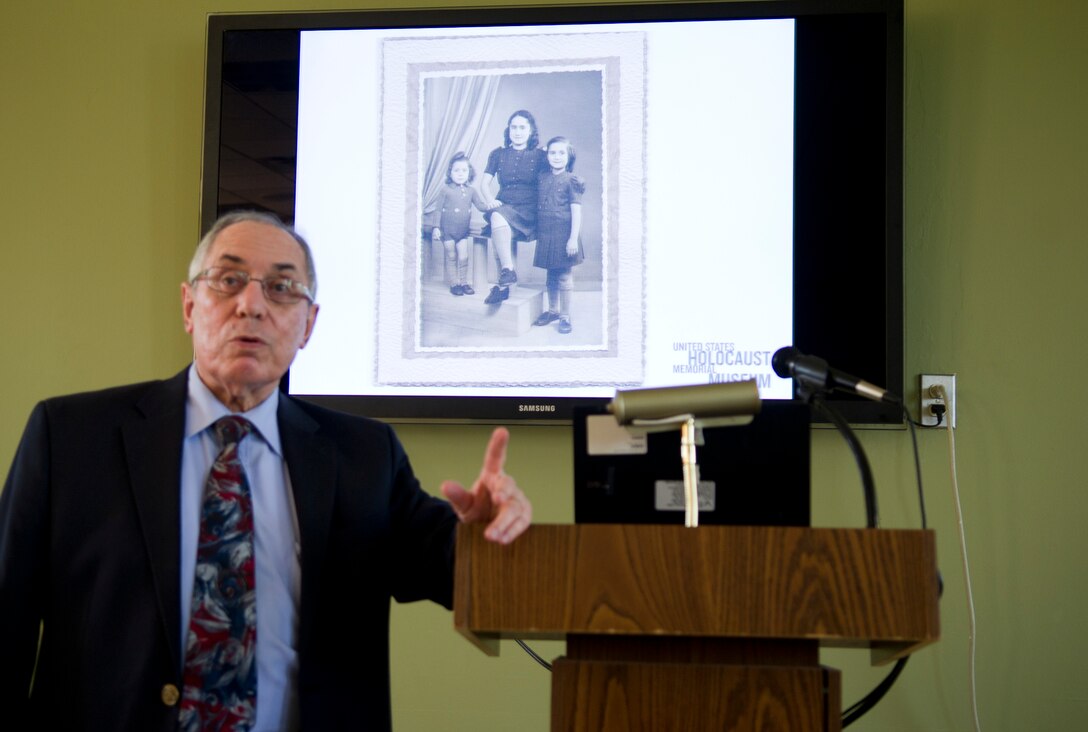 Albert Garih, a holocaust survivor, shares his experience in honor of Holocaust Remembrance Day, at the Chapel 1 Annexon Joint Base Andrews, Md., April 13, 2015. Garih shared his account of the German occupation of Paris and the liberation that followed.  (U.S. Air Force photo/Senior Airman Mariah Haddenham)