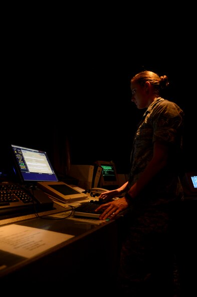 Airman 1st Class Jordan Futch, 2nd Operations Support Squadron air traffic control apprentice, updates the Automatic Terminal Information Service system on Barksdale Air Force Base, La., April 8, 2015. The ATIS updates every hour, giving pilots current weather and airfield status. (U.S. Air Force photo/Senior Airman Joseph A. Pagán Jr.)