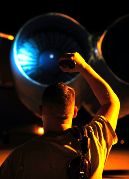 Staff Sgt. Richardt Figueroa, 20th Aircraft Maintenance Unit crew chief, inspects intake blades on a B-52H Stratofortress on Barksdale Air Force Base, La., April 8, 2015. Crew chiefs are responsible for the entire aircraft and ensuring it is ready day or night. They are experts in keeping the plane fit-to-fly by inspecting engines, hydraulics, electrical, tires, brakes and more to ensure aircrew's safety. (U.S. Air Force photo/Staff Sgt. Jason McCasland)