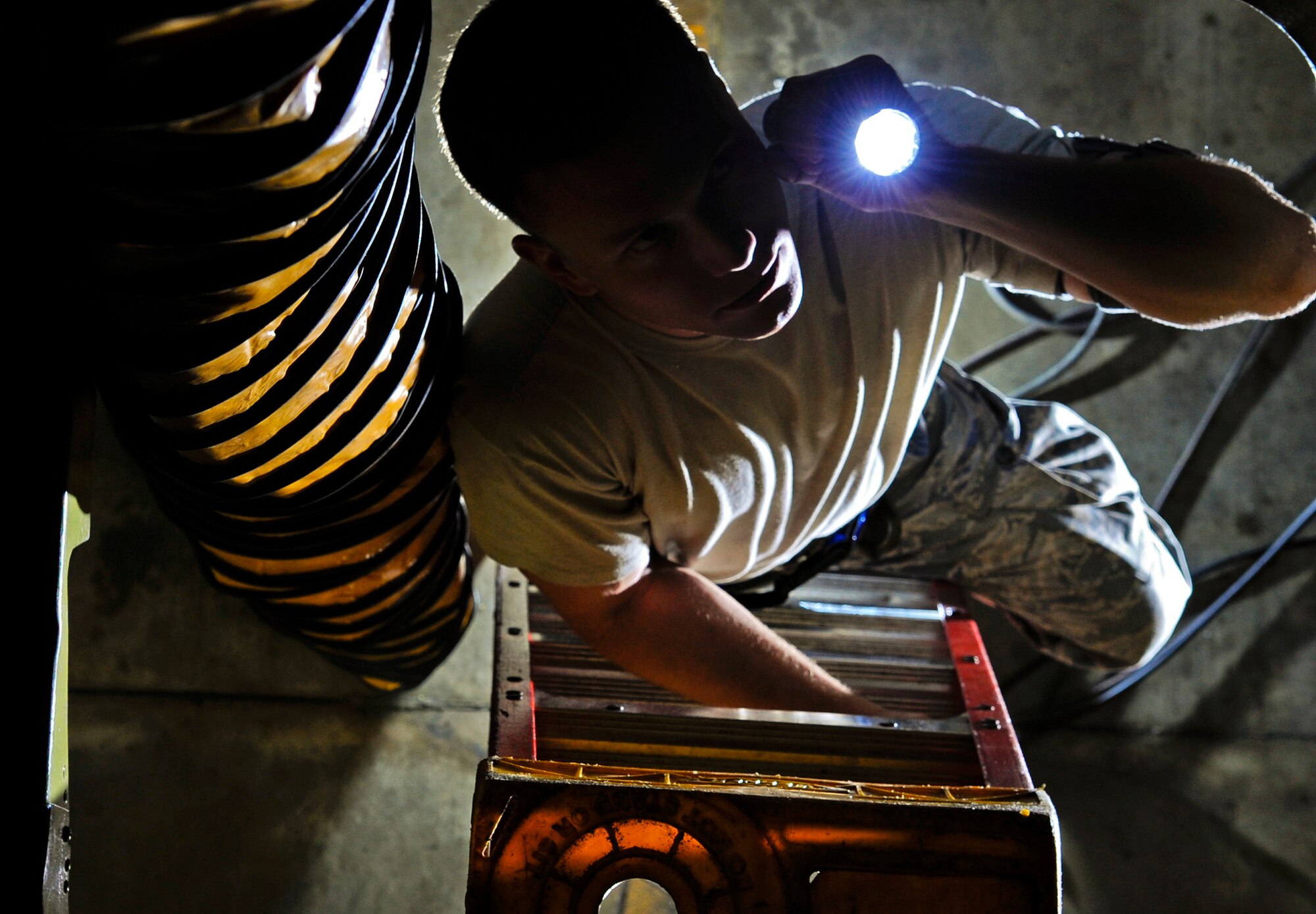 Senior Airman Cody Brann, 2nd Maintenance Squadron avionics backshop, inspects the 47-section of a B-52H Stratofortress on Barksdale Air Force Base, La., April 8, 2015. The B-52 has onboard systems such as flight control, communications and navigation which must be inspected during regular intervals to ensure the systems are working properly. (U.S. Air Force photo/Staff Sgt. Jason McCasland)