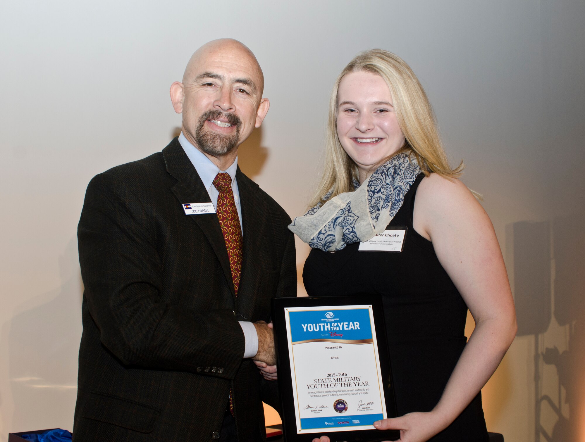DENVER, Colo. -- Boys & Girls Clubs of Colorado and Team Pete Military Youth of the Year award winner Jennifer Choate is congratulated by Lt. Gov. Joe Garcia during the awards ceremony March 24. (Courtesy photo)