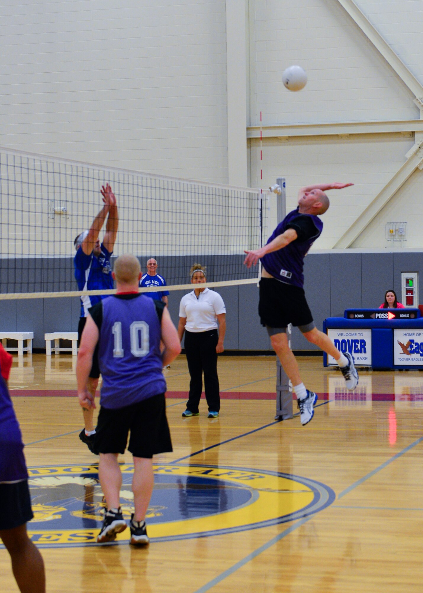 Steven Dirksen, 3d Airlift Squadron/436th Operations Support Squadron player, jumps to spike a volleyball during an intramural volleyball game April 9, 2015, at the fitness center on Dover Air Force Base, Del. Dirksen’s team was unable to overcome the 436th Maintenance Squadron “A” team. (U.S. Air Force photo/Airman 1st Class Zachary Cacicia)