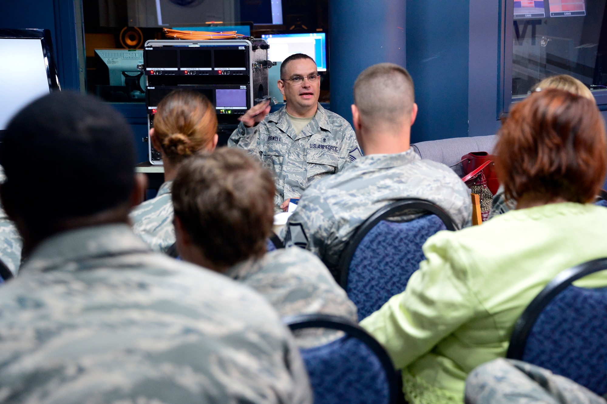 MCGHEE TYSON AIR NATIONAL GUARD BASE, Tenn. - Master Sgt. Clifton Boswell, class instructor, reviews and critiques recorded broadcasts with students April 14, 2015, during the on-camera instructors' course at the I.G. Brown Training and Education Center television studios.  (U.S. Air National Guard photo by Master Sgt. Mike R. Smith/Released)