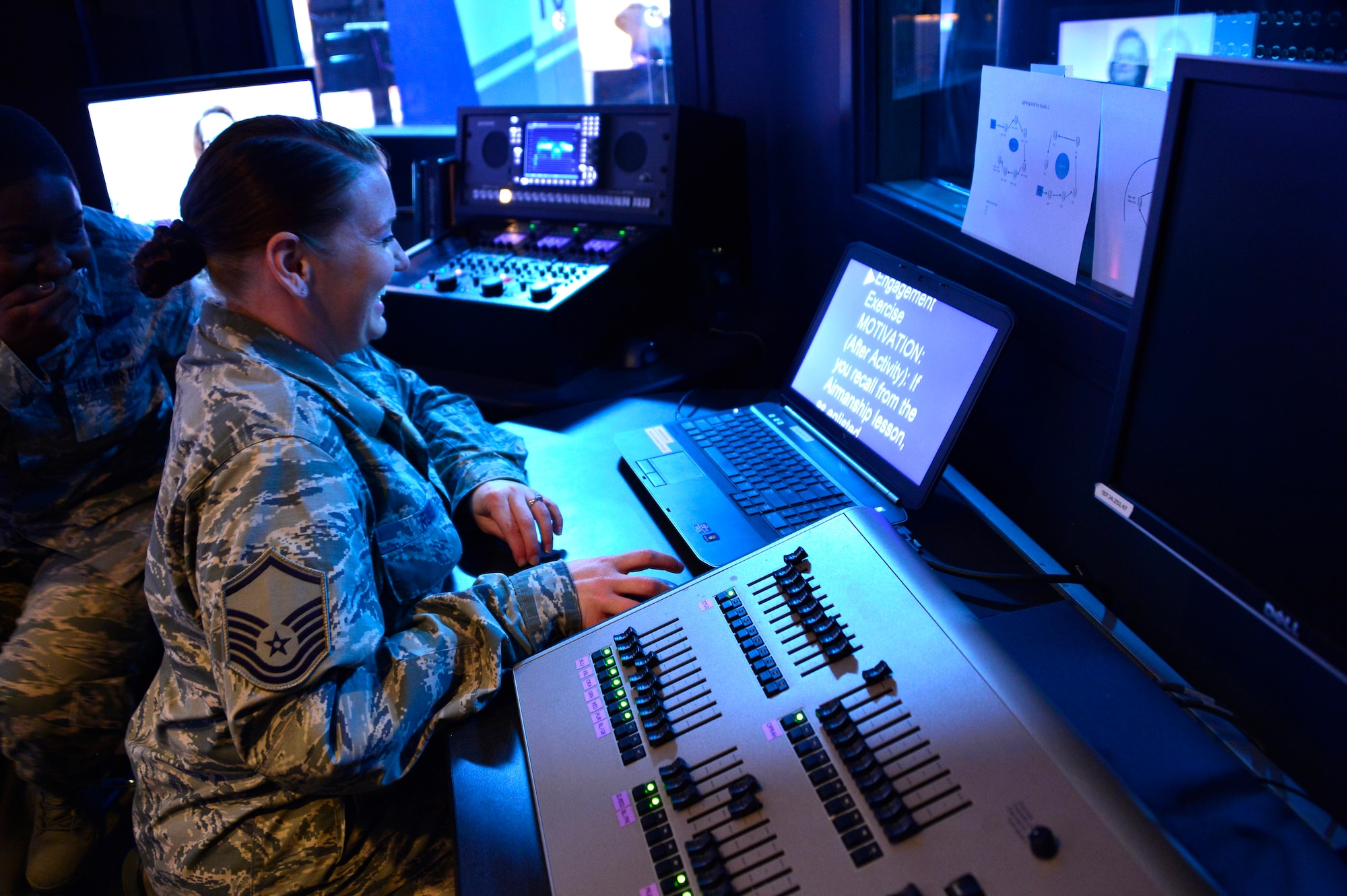 MCGHEE TYSON AIR NATIONAL GUARD BASE, Tenn. - Master Sgt. Elizabeth Ruiz, satellite EPME superintendent for the Paul H. Lankford EPME Center, and Staff Sgt.  Chalanda Roberts, broadcast technician, manage the broadcast control room for TEC TV during a satellite EPME practice broadcast here April 14, 2015, during the on-camera instructors' course.  (U.S. Air National Guard photo by Master Sgt. Mike R. Smith/Released)