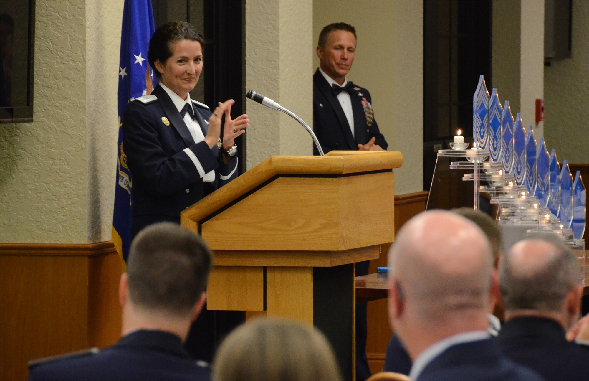 Brig. Gen. Nina M. Armagno, commander of the 45th Space Wing, Patrick AFB, pays tribute to the 920th Rescue Wing's three newest chief master sergeants during a Chief Induction Ceremony held at the Manatee Golf Club here April 11. The three Reserve Airmen are Senior Master Sgt. Michael Ziegler, senior enlisted manager and pararescuemen here; Chief Master Sgt. Christopher Neitzel, operations superintendent at the 943rd Rescue Group, Davis-Monthan AFB, Arizona; and Chief Master Sgt. Robert Briere, chief enlisted manager at the 943rd Rescue Squadron, Portland International Airport, Oregon. Both the 943rd and 304th are geographically separated units of the 920th Rescue Wing. (U.S. Air Force photo/Master Sgt. Paul Flipse)