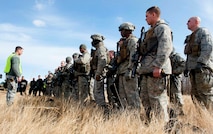 Members of the 791st Missile Security Forces Squadron convoy response force are debriefed after a tactical training exercise in Garrison, N.D., March 26, 2015. The week-long training was in preparation for the Air Force Global Strike Command Road Warrior Exercise that is scheduled to take place in May. (U.S. Air Force photos/Airman 1st Class Sahara Fales)