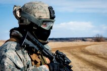 A member of the 791st Missile Security Forces Squadron convoy response force participates in a tactical training exercise in Garrison, N.D., March 26, 2015. The week-long training was in preparation for the Air Force Global Strike Command Road Warrior Exercise that is scheduled to take place in May. (U.S. Air Force photos/Airman 1st Class Sahara Fales)