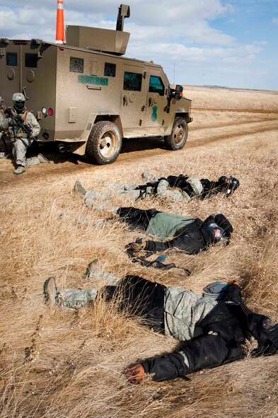 Members of the 791st Missile Security Forces Squadron convoy response force participate in a tactical training exercise in Garrison, N.D., March 26, 2015. The week-long training was in preparation for the Air Force Global Strike Command Road Warrior Exercise that is scheduled to take place in May. (U.S. Air Force photos/Airman 1st Class Sahara Fales)