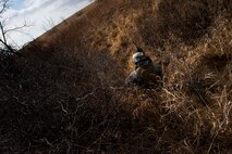 A member of the 791st Missile Security Forces Squadron convoy response force participates in a tactical training exercise in Garrison, N.D., March 26, 2015. The week-long training was in preparation for the Air Force Global Strike Command Road Warrior Exercise that is scheduled to take place in May. (U.S. Air Force photos/Airman 1st Class Sahara Fales)