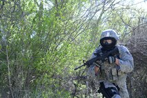Staff Sgt. Matthew Solis, 47th Security Forces Squadron defender, runs for cover during a live-fire exercise at Laughlin Air Force Base, Texas, March 28, 2015. While running, defenders had to be aware of their surroundings to ensure they didn’t end themselves up in a problematic situation. (U.S. Air Force photo by Airman 1st Class Jimmie D. Pike)(Released)
