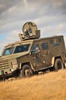 A member of the 791st Missile Security Forces Squadron convoy response force provides security from a turret during a tactical training exercise in Garrison, N.D., March 26, 2015. The purpose of the week-long training was to prepare the CRF team for Road Warrior Exercise, an Air Force Global Strike Command exercise scheduled for May. (U.S. Air Force photo/Airman 1st Class Apryl Hall)