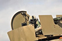 A member of the 791st Missile Security Forces Squadron convoy response force provides security from a turret during a tactical training exercise in Garrison, N.D., March 26, 2015. The purpose of the week-long training was to prepare the CRF team for Road Warrior Exercise, an Air Force Global Strike Command exercise scheduled for May. (U.S. Air Force photo/Airman 1st Class Apryl Hall)