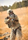 Senior Airman Michael Tyler, 791st Missile Security Forces Squadron convoy response force member, inspects a vehicle during a tactical training exercise in Garrison, N.D., March 26, 2015. Force on force exercises allow defenders to get hands-on combat training in a realistic scenario. (U.S. Air Force photo/Airman 1st Class Apryl Hall)