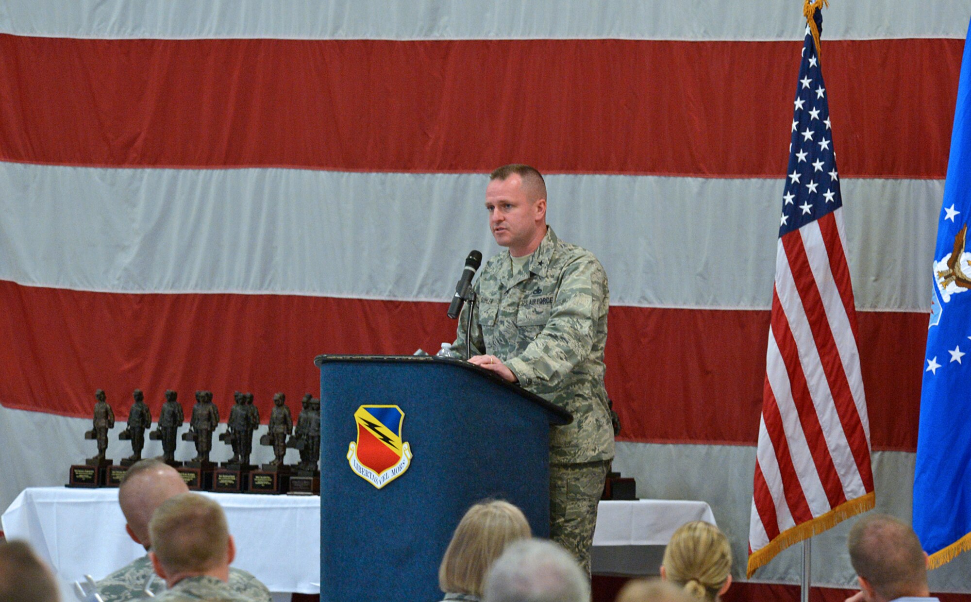 Ogden Air Logistics Complex Commander Brig. Gen. Carl Buhler speaks to Airmen at the 2014 Maintenance Professional of the Year award ceremony April 11, 2015. Buhler, who has performed a variety of munitions and maintenance missions over the course of his career, lauded the group for their efforts in 2014. (U.S. Air Force photo by Alex R. Lloyd)