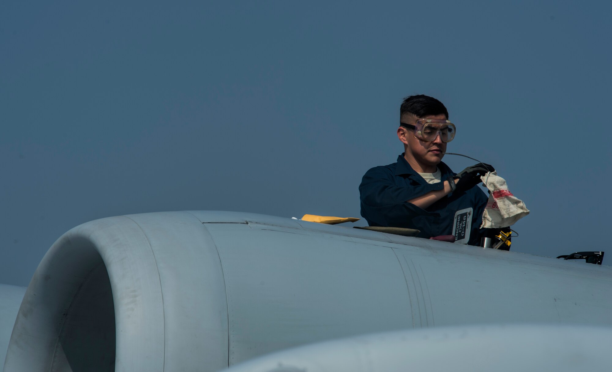 An aircraft maintainer assigned to the 354th Expeditionary Fighter Squadron inspects the oil levels of an A-10 Thunderbolt II attack aircraft engine during a theater security package deployment to Namest Air Base, Czech Republic, April 10, 2015. These deployments would not be possible without the strategic access provided by the infrastructure, support and host-nation relationships in the European region. (U.S. Air Force photo by Staff Sgt. Christopher Ruano/Released)