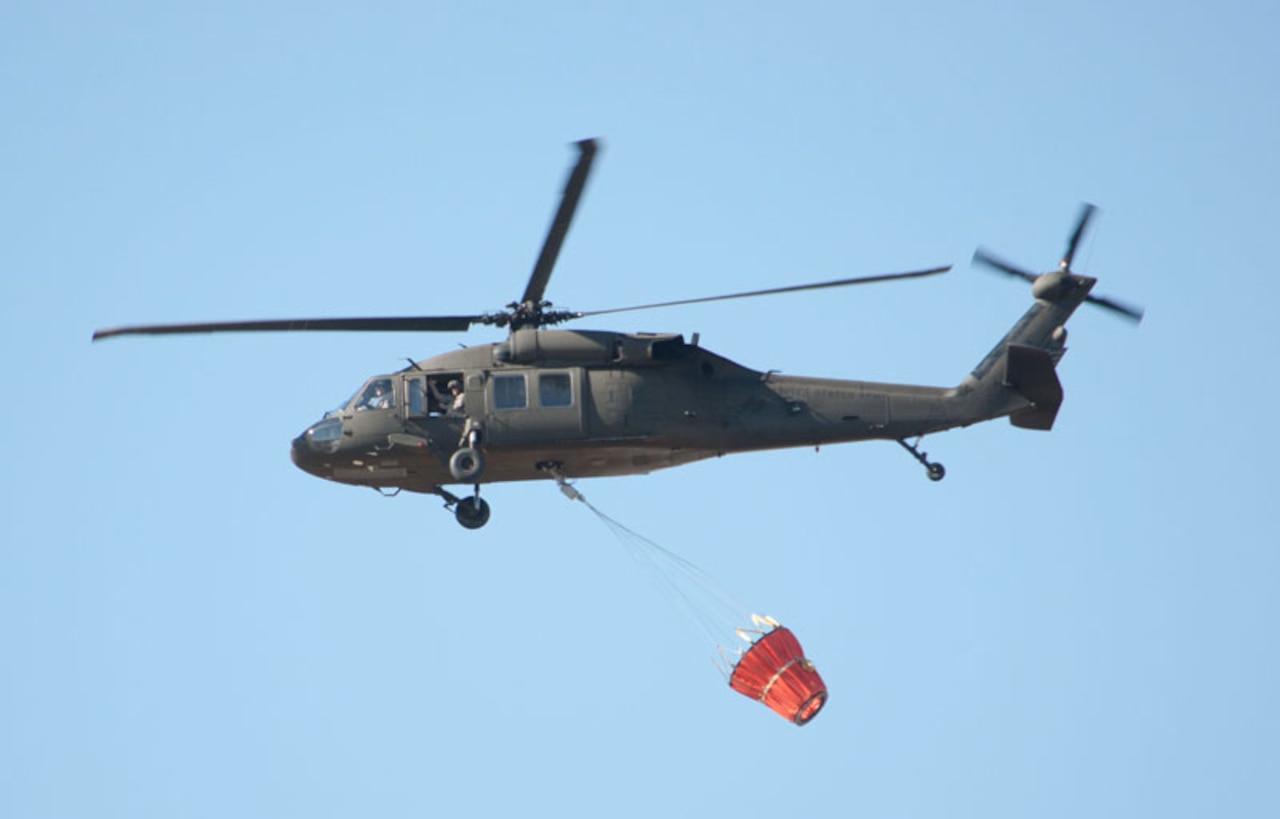 A North Dakota Army National Guard UH-60 Black Hawk helicopter departs from the Guard's Army Aviation Support Facility in Bismarck, N.D., April 13, 2015. It was one of two Guard helicopters en route to a mission supporting local response authorities fighting a wildfire in Burleigh County. U.S. Army National Guard photo by Laura Prokopyk