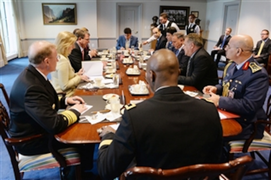 U.S. Defense Secretary Ash Carter, third from left, meets with Iraqi Defense Minister Khalid al-Obeidi, third from right, at the Pentagon, April 14, 2015.