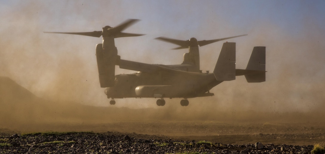 An MV-22B Osprey with Marine Operational Test and Evaluation Squadron 22, prepares to land during reduced visibility landing aboard Kirtland Air Force Base, Albuquerque, New Mexico, April 2, 2015. During the flight, crew chiefs are the second pair of eyes for the pilot by helping them land and trouble-shoot potential problems. The crew chiefs are also responsible for maintaining and firing the aircraft’s weapons systems. (U.S. Marine Corps photo by Cpl. Andy J. Orozco/Released)