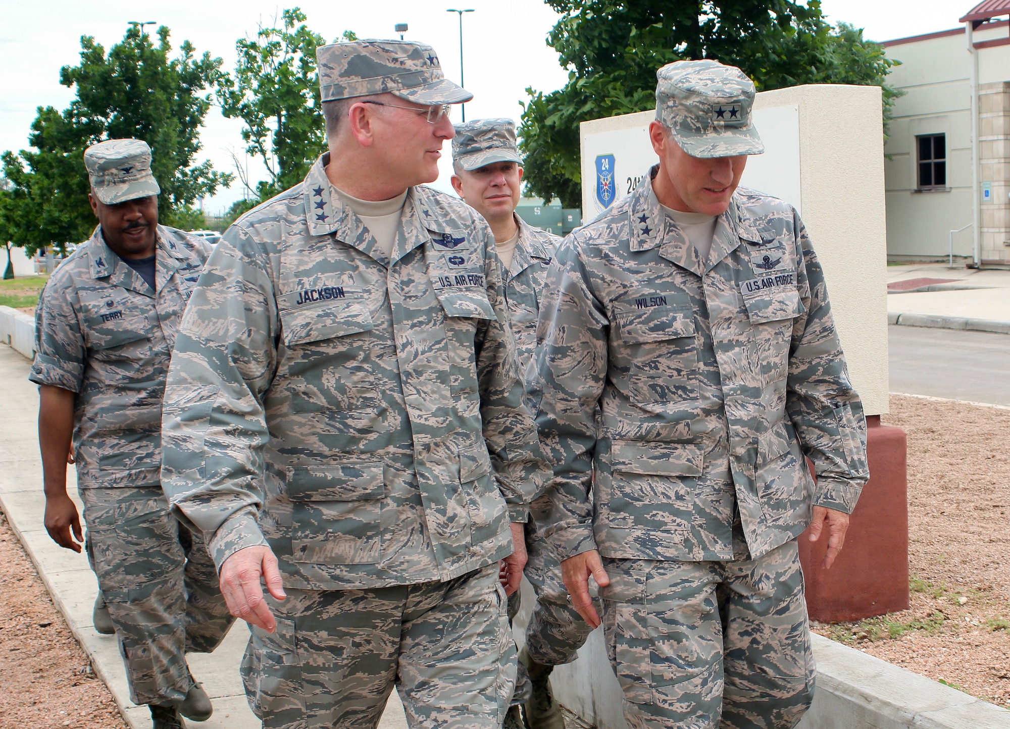 Lt. Gen. James F. Jackson, Air Force Reserve Command commander, talks with Maj. Gen. Burke "Ed" Wilson, 24th Air Force commander, during his visit April 10 with the 960th Cyberspace Operations Group at Joint Base San Antonio-Lackland, Texas. Activated in 2013, the 960 CyOG is the first cyberspace group in the Air Force and has administrative control over 10 Reserve cyber organizations throughout the country. Both the Air Force Reserve and 24th Air Force are committed to building integrated, experienced Air Force cyber forces for the nation.