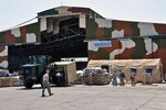 U.S. Air Force airmen place equipment and prepare to establish operations with the Pakistan Air Force's Central Flood Relief Cell in Rawalpindi, Pakistan, Aug. 29, 2010. About 40 airmen assigned to the U.S. Air Force's 621st Contingency Response Wing are working with Pakistani officials to support humanitarian airlift operations and deliver relief supplies to locations throughout Pakistan.