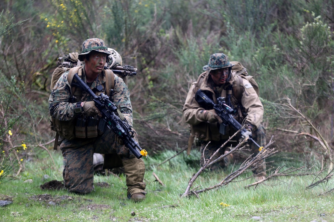 Marines with Company C, 1st Reconnaissance Battalion, provide security for their team during a simulated casualty evacuation aboard Joint Base Lewis-McChord, Wash, April 10, 2015. Marines with the company operated in remote locations of the wilderness and provided surveillance of the surrounding area to paint the commander a picture of the battlefield. During the patrol, the reconnaissance men navigated through several kilometers of thick brush and provided surveillance on numerous named areas of interest. The patrol was one of many exercises the company will complete as part of a combat readiness evaluation in preparation for an upcoming deployment.
(U.S. Marine Corps photo by Sgt. Joseph Scanlan / released)
