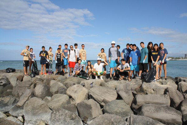More than 40 volunteers from the U.S. Army Corps of Engineers partnered with local JROTC students and others to clean up Waikiki Beach April 11 as part of Earth Month 2015. Over 20 volunteers from the Punahou Junior ROTC program (which includes cadets from other area high schools and some home-schooled students) joined over 20 Corps employees and their friends and families to clean up the beach and berm area at the Corps' Pacific Regional Visitor Center (RVC) at Fort DeRussy in Waikiki. 