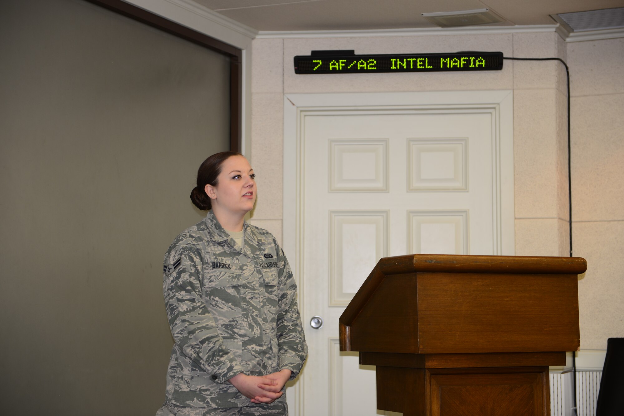 Airman 1st Class Baylie Barrick, 607th Air Operations Center Geospatial Intelligence targeteer, gives a briefing April 10, 2015, at Osan Air Base, Republic of Korea. Individuals
who are chosen for this spotlight recognition are distinguished as consistent, superior performers within their squadrons. (U.S. Air Force photo by Staff Sgt. Benjamin Sutton/Released)
