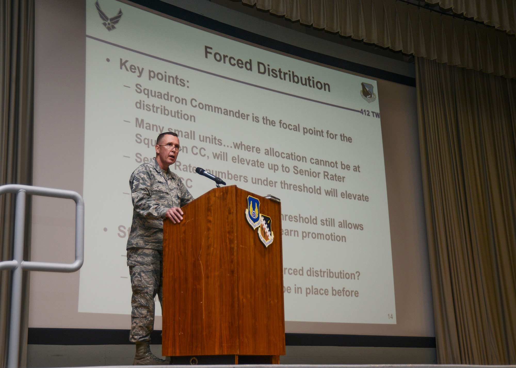Chief Master Sgt. David Smith, 412th Test Wing command chief hosted a mandatory enlisted all-call at the base theater April 13. (U.S. Air Force photo by Rebecca Amber)