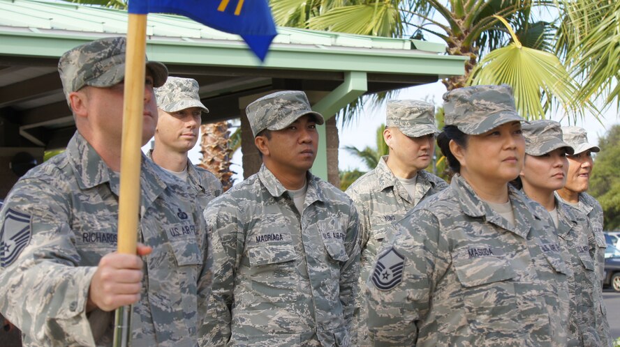 Members of the 154th Wing Comptroller Flight stand at the ready for the change of command ceremony, Apr. 11, 2015, Joint Base Pearl Harbor-Hickam, Hawaii (U.S. Air National Guard Photo by Tech. Sgt. Andrew Lee Jackson/Released)


