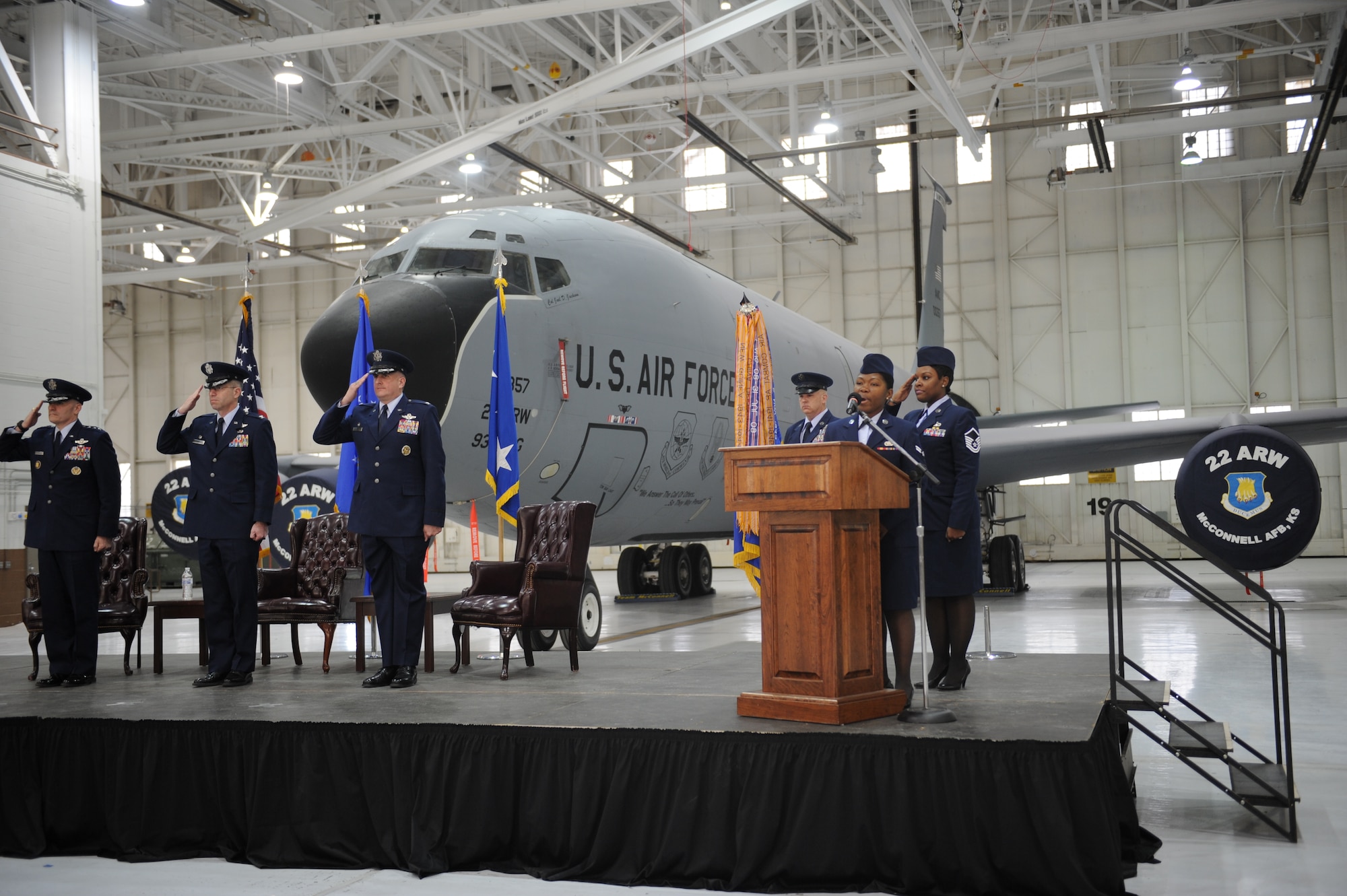 Airman 1st Class Bernice Yunwe Kwasinyui, 22nd Logistics Readiness Squadron aircraft parts store technician, sings the national anthem during a change of command ceremony, Feb. 12, 2015, at McConnell Air Force Base, Kan. Yunwe Kwasinyui, a Cameroon native, won a visa to come to the United States and joined the Air Force to give back to a country that has impacted her life.  (U.S. Air Force photo by Airman 1st Class Tara Fadenrecht)