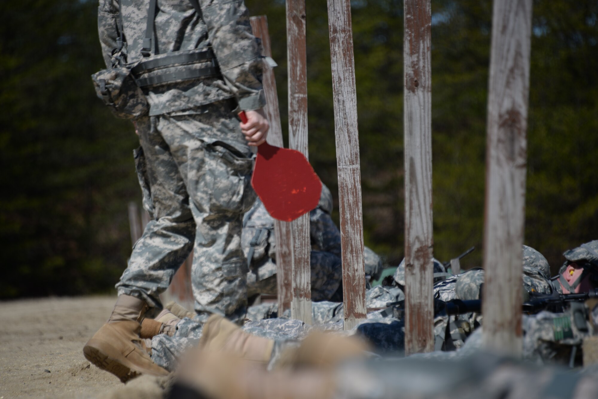 Range instructors from the 75th Training Command Atlantic Division supervise Soldiers competing in the Best Warrior Competition’s rifle marksmanship portion on Joint Base McGuire-Dix-Lakehurst, N.J., April 11, 2015. Winners of the competition are named Soldier and NCO of the year. (U.S. Air Force photo/Airman 1st Class Lauren Pitts) 