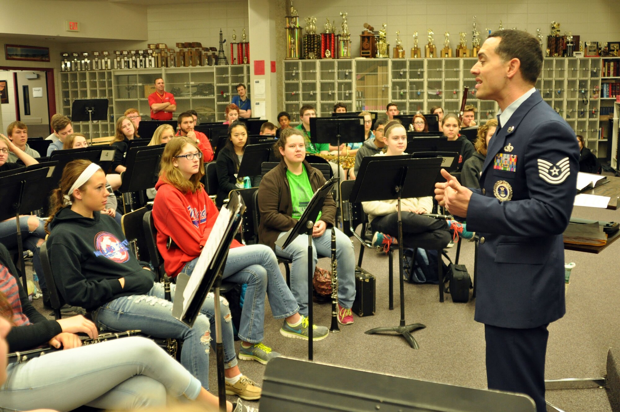 U.S. Air Force Tech. Sgt. Byron Lawson, Air Force recruiter, talks to Millard South High School band students about the Air Force April 14 as part of the Heartland of America Band’s visit to the school. Lawson coordinated the event to show students about the various opportunities in the Air Force. (U.S. Air Force photo by Staff Sgt. Rachelle Blake)

