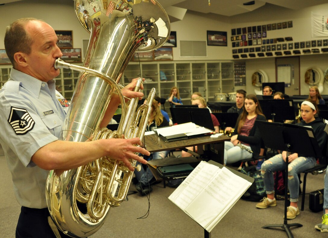U.S. Air Force Master Sgt. Alex Serwatowski, Heartland of America band member, performs for the Millard South High School band students April 14 as part the band’s visit to the school. The band visits schools as part of their community outreach program. (U.S. Air Force photo by Staff Sgt. Rachelle Blake)