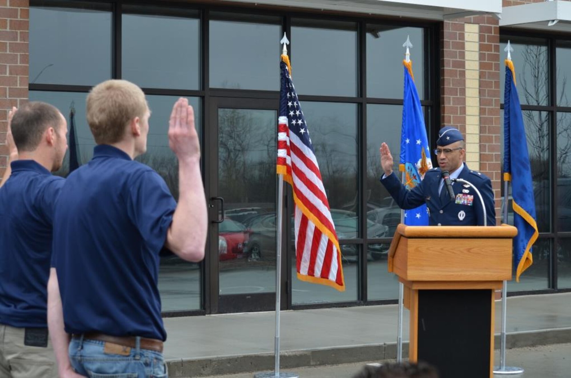 U.S. Air Force Brig. Gen. James Johnson, AFRS commander, swears in new recruits April 8 during the ribbon cutting ceremony of the AFRS’s newest hub in Waukee, Iowa. This is the sixth hub to open since the Flight-Centric Transformation program began two years ago. (U.S. Air Force photo/Senior Master Sgt. Michael Galea)