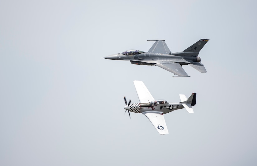 A Heritage Flight formation consisting of an F-16 Fighting Falcon and a P-51 Mustang fly  April 10, 2015 during the 2015 Beaufort Airshow at Marine Corps Air Station Beaufort, S.C. The F-16 Viper Demo Team from Shaw Air Force Base, S.C., was part of the three day show which demonstrated the capabilities of U.S. military air power. (U.S. Air Force photo by Airman 1st Class Clayton Cupit)