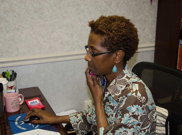 Jennifer Green, 628th Medical Group Family Advocacy Treatment manager, schedules an appointment April 14, 2015 at Joint Base Charleston – Air Base, S.C. The Family Advocacy Program or FAP was designed to prevent domestic abuse and child abuse and neglect by providing education and awareness programs for all members of the military community. (U.S. Air Force photo/Staff Sgt. AJ Hyatt)