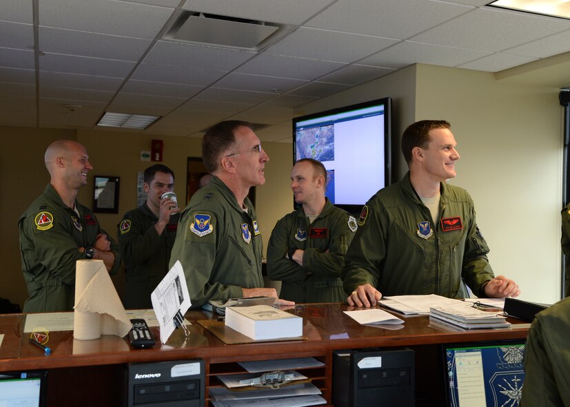 Maj. Gen. Scott Vander Hamm, 8th Air Force commander, receives a final weather update before his final flight on Barksdale Air Force Base, La., April 13, 2015. Vander Hamm commanded the "Mighty 8th" for almost two years and was given the opportunity to fly a B-52H Stratofortress one last time before leaving. (U.S. Air Force photo/Senior Airman Joseph A. Pagan Jr.)