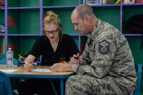 Master Sgt. Tom Curran, Headquarters Air Education and Training Command/A4MA F-16 functional manager, and his daughter, Olivia, take part in the "Because We Have Daughters" event April 9 at the Joint Base San Antonio-Randolph Youth Center. "Because We Have Daughters" is a workshop that uses activities to help fathers and daughters forge new bonds and find ways to discuss challenging issues and is one of the featured Sexual Assault Awareness and Prevention Month events at JBSA-Randolph.  (U.S. Air Force photo by Airman 1st Class Stormy Archer)
