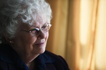 Joanna Millan relates her testimony of surviving the Holocaust during a remembrance luncheon at RAF Alconbury, England, April 14, 2015. Millian was one of fewer than 100 children who survived interment at the Theresienstadt ghetto camp. (U.S. Air Force photo by Staff Sgt. Jarad A. Denton/Released)