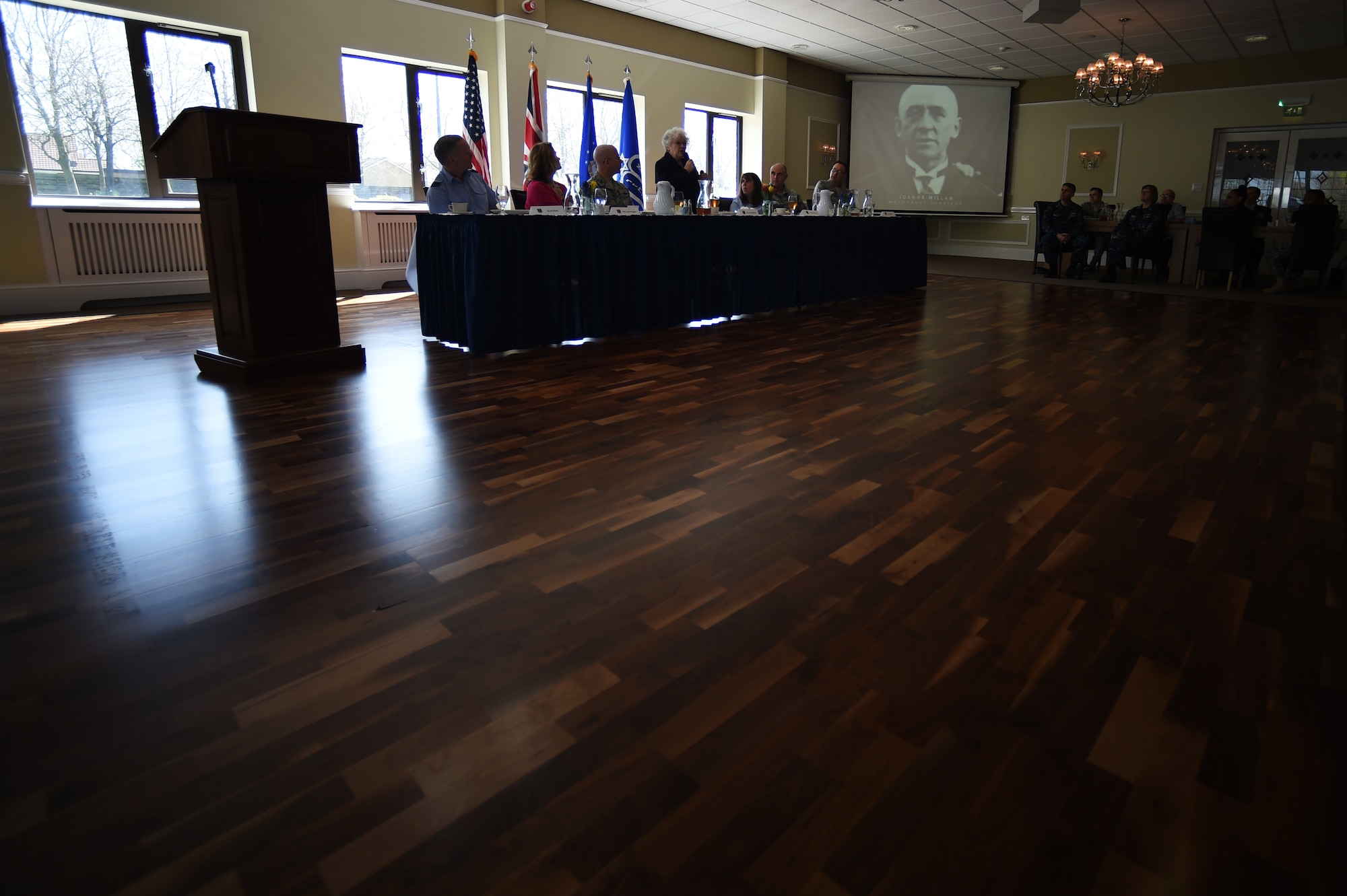 Joanna Millan speaks about the Rosenthal family and its tragic tale of loss during the Holocaust during a remembrance luncheon at RAF Alconbury, England, April 14, 2015. During World War II, the Nazi regime systematically annihilated six million Jews, many of whom died in gas chambers at one of thousands of concentration camps throughout Europe. (U.S. Air Force photo by Staff Sgt. Jarad A. Denton/Released)