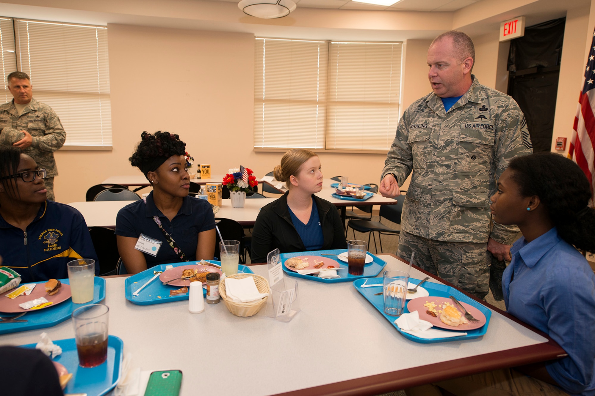 U.S. Air Force Chief Master Sgt. James W. Hotaling, Command Chief Master Sgt. for the Air National Guard, speaks to new enlistees while visiting the South Carolina Air National Guard's 169th Fighter Wing at McEntire Joint National Guard Base, S.C., April 11, 2015. Hotaling hosted town hall meetings to engage Swamp Fox Airmen in the discussion of three key points; the profession of arms, the health of the force and recognizing and renewing commitments to Airmen.  (U.S. Air National Guard photo by Tech. Sgt. Jorge Intriago/RELEASED)