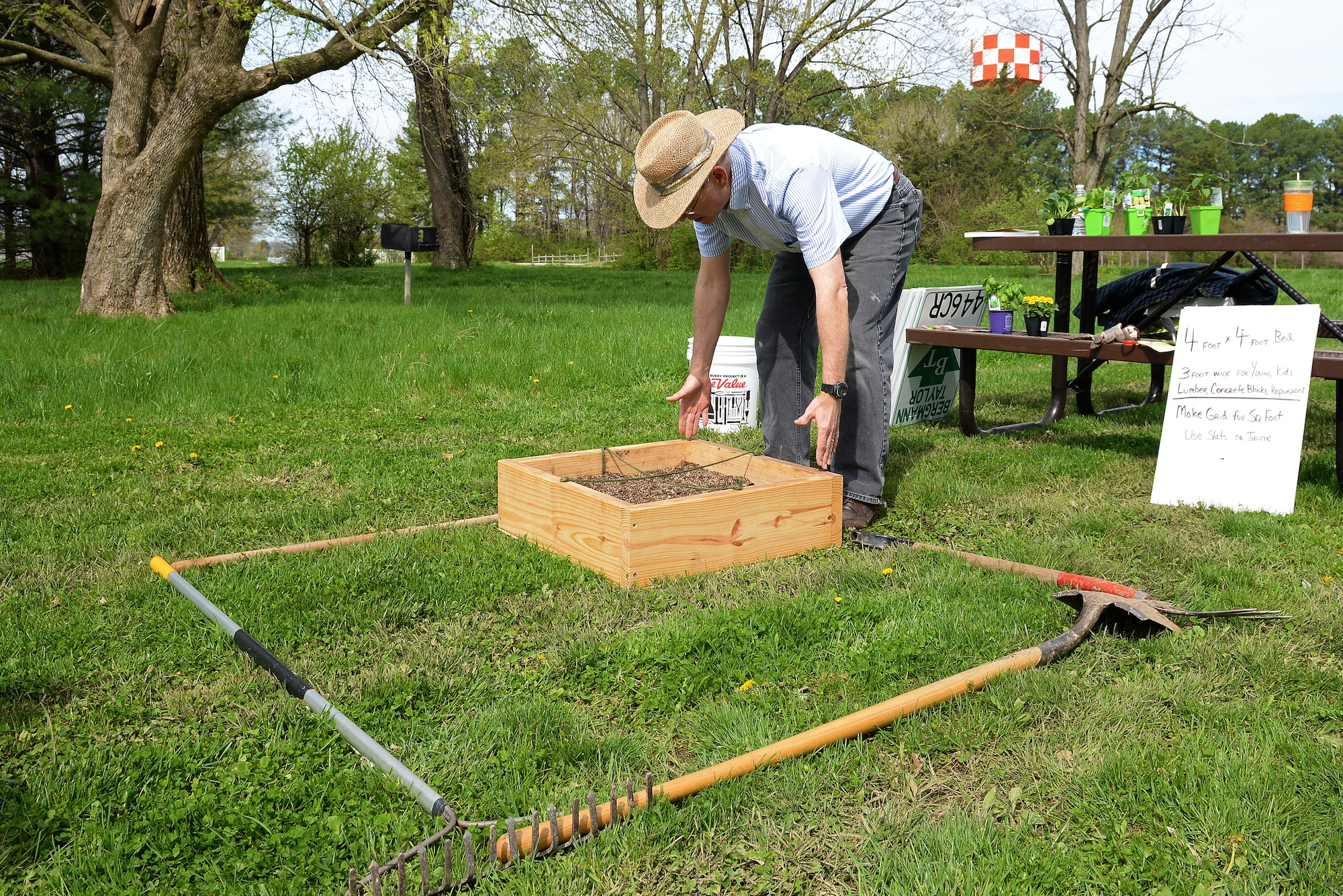 Jonathan Svoboda, President of the Lebanon Gardening Club, teaches a gardening clinic to base community members at Scott Air Force Base, Illinois, April 11, 2015. He showed interested gardeners about the how they can integrate caring for plants into their lives, even if it’s a windowsill garden or rows and rows of vegetables. (U.S. Air Force photo by Airman 1st Class Erica Crossen)